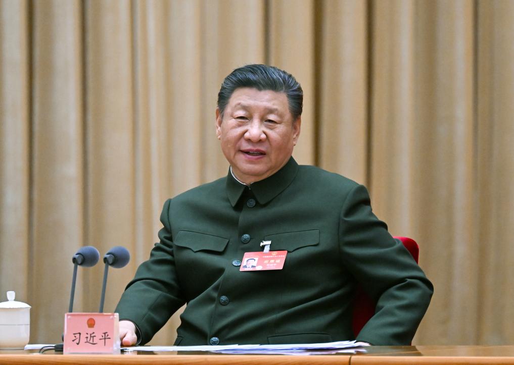 Ο Κινέζος Πρόεδρος Σι Τζινπίνγκ, επίσης γενικός γραμματέας της Κεντρικής Επιτροπής του Κομμουνιστικού Κόμματος της Κίνας και πρόεδρος της Κεντρικής Στρατιωτικής Επιτροπής, παρευρίσκεται σε συνεδρίαση της ολομέλειας της αντιπροσωπείας του Λαϊκού Απελευθερωτικού Στρατού (PLA) και της Λαϊκής Ένοπλης Αστυνομικής Δύναμης στη δεύτερη σύνοδο του 14ου Εθνικού Λαϊκού Συνεδρίου (ΕΛΣ) στο Πεκίνο, πρωτεύουσα της Κίνας, 7 Μαρτίου 2024. (Xinhua/Li Gang)